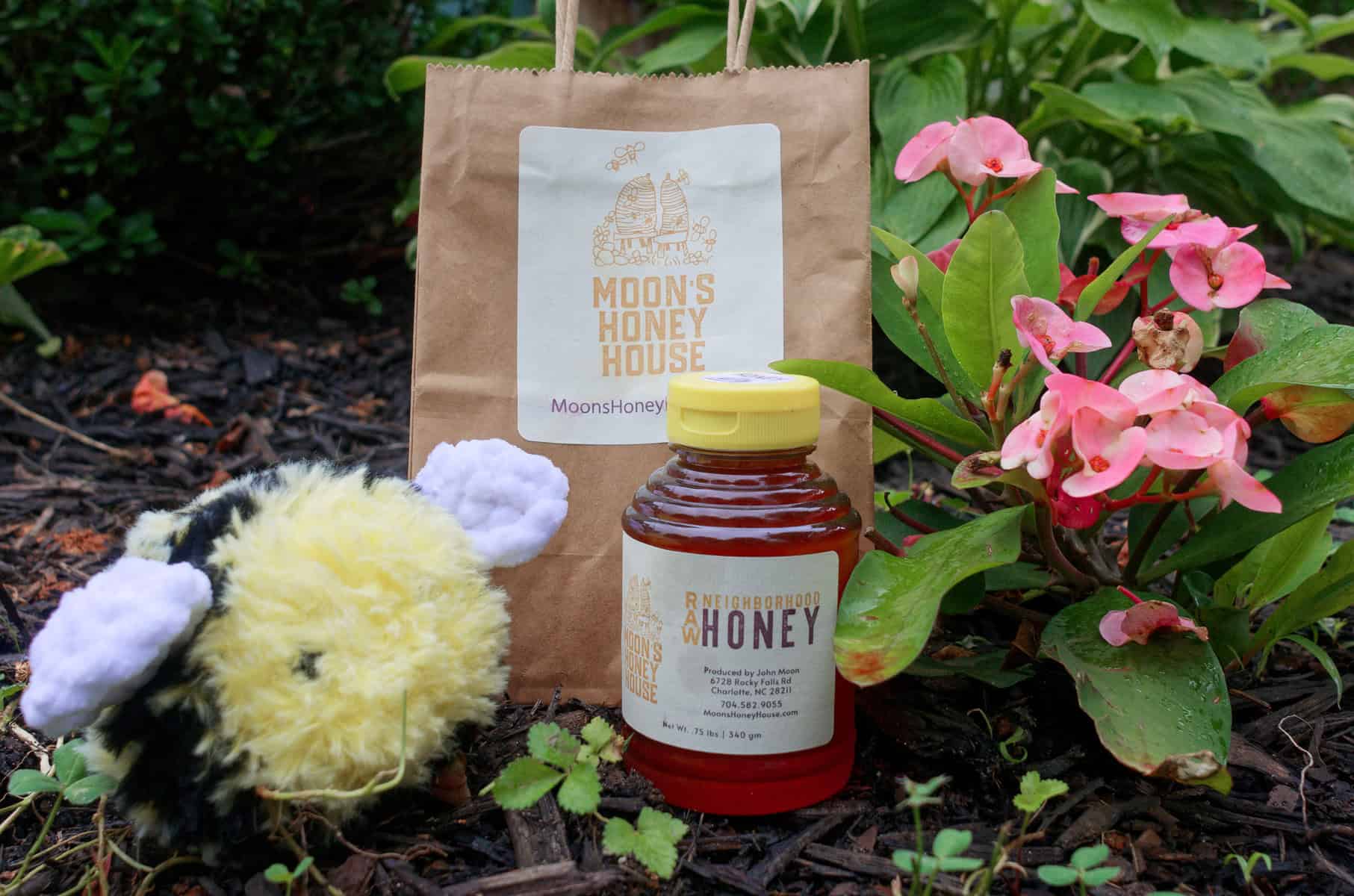 Moon's Honey House Raw Neighborhood Honey plush bee and gift bag purchased from charlotte regional farmers market